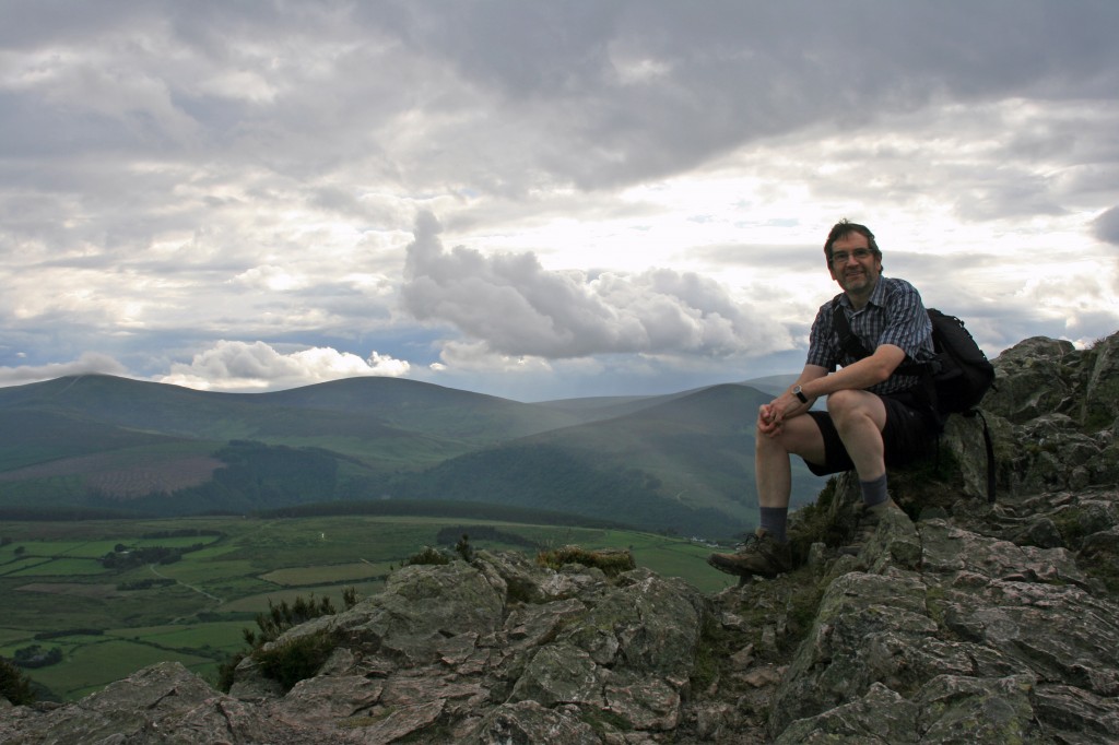 David on top of the Great Sugar Loaf - Wicklow Hills behind