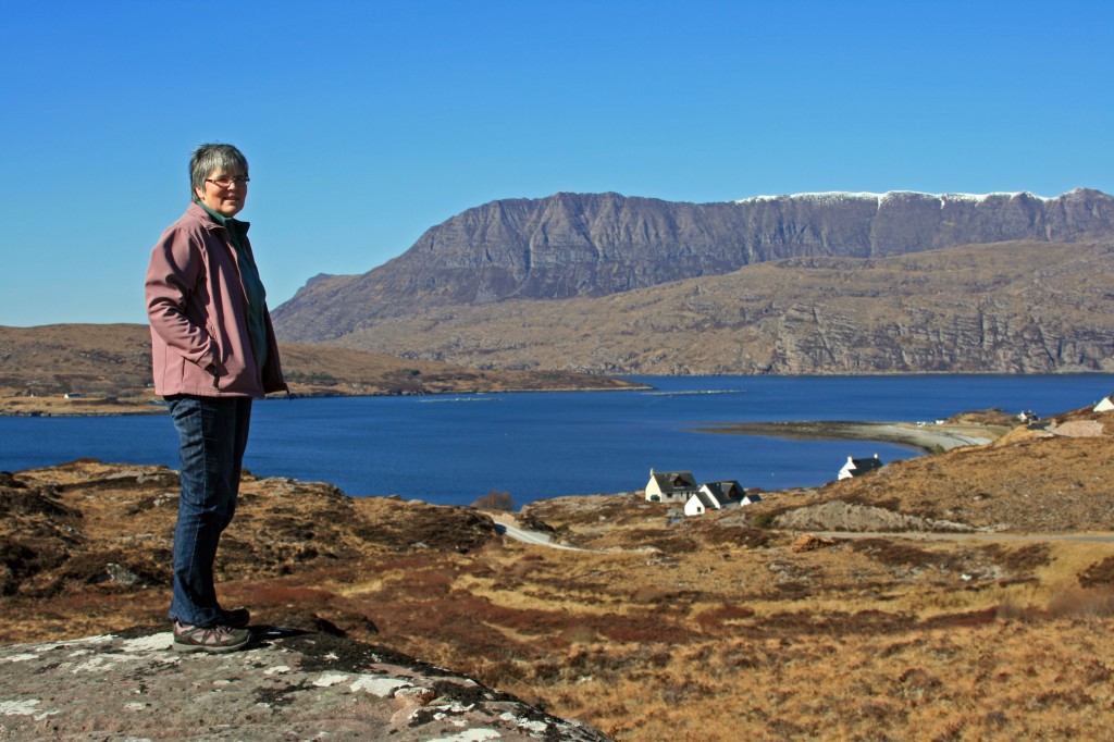 Anne at Ardmair, with Ben Mor Coigach behind